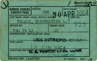 Green paper liberty pass with typed information in boxes and stamped portions over top
