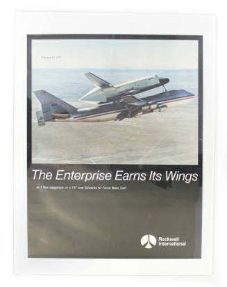 Color poster depicting Enterprise being flown on the back of a 747 airplane with brown, arid la…