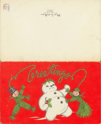 Christmas card laid flat vertically, bottom half has red background with "Greetings" written ab…