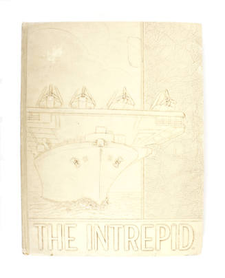 Beige hardcover USS Intrepid cruise book for 1943 to 1945 with a raised image of Intrepid and a…