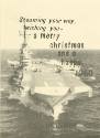 Printed holiday card with a photograph of USS Intrepid at sea that reads "Steaming your way, wi…