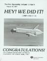 Printed page that reads "Hey! We Did It!" with a photograph of the space shuttle orbiter