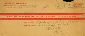 Tan envelope addressed to Richard E. Johnson with red lines and red text that reads "Official B…