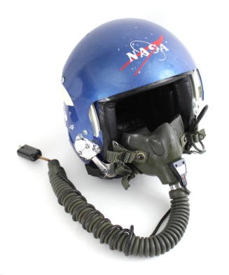 Front view of blue NASA flight helmet with oxygen mask attached
