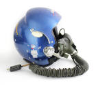 Side view of blue NASA flight helmet with attached oxygen mask