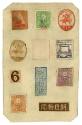 Sheet of paper with eleven colored Japanese stamps affixed to the sheet