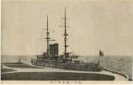 Black and white commercial Japanese postcard showing a ship in port