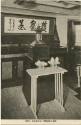 Black and white commercial Japanese postcard showing interior of a temple
