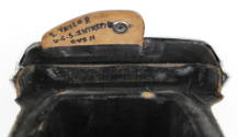 Leather flap inside black camera case with handwritten inscription “S. Taylor U.S.S. Intrepid C…