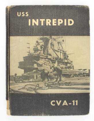 Cover of USS Intrepid cruise book with black and white photo of aircraft carrier flight deck an…