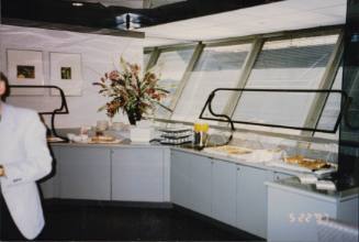 Color image of a food buffet or bar in the British Airways Concorde boarding lounge
