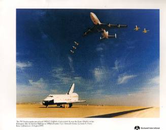 Color photograph of shuttle carrier aircraft and chase planes flying over Enterprise in formati…