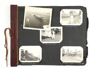 Scrapbook with missing cover, first page has five black and white photos of USS Intrepid and th…