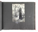 Scrapbook page with black and photograph of a male sailor and a woman, captioned “Betty & I”