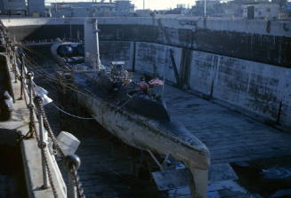 Color photograph of USS Growler in dry dock