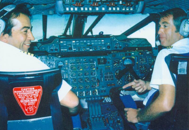 Color photograph of two pilots in Concorde's cockpit