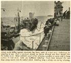 Printed magazine clipping with a photograph of a carrier refueling at sea