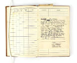 Interior of aviator flight log book open to show printed insert from February 16, 1944