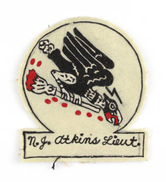 Circular insignia patch with image of diving vulture grasping a broom in its talons with blood …
