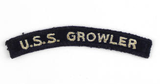 Dark blue U.S. Navy shoulder patch with "U.S.S. Growler" sewn in white