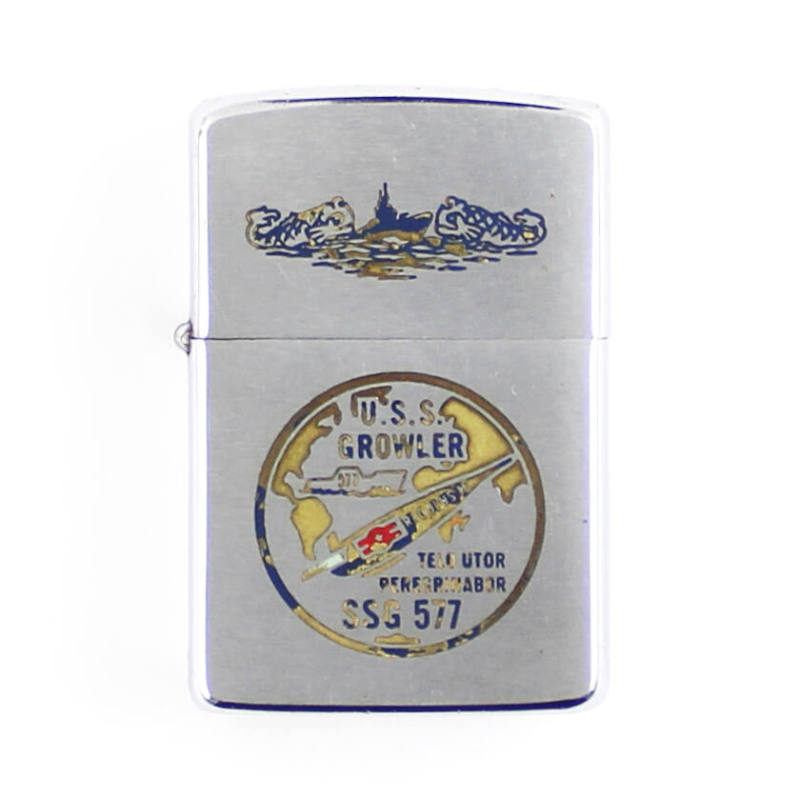 Lighter with engraved image of submarine dolphins on lid and circular USS Growler insignia on t…