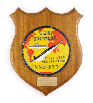 Plaque with circular USS Growler insignia in center depicting Growler positioned in the Atlanti…