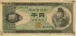 Printed green and tan Japanese currency of 1000 yen