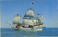 Postcard with colored image of a ship with sails unfurled at sea, the hull of the ship is paint…