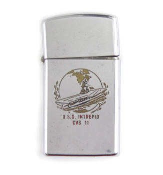 Lighter with engraving of a globe and aircraft carrier at sea, inscription "U.S.S. Intrepid CVS…
