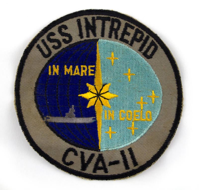 Embroidered USS Intrepid insignia patch, insignia shows aircraft carrier at sea bisected with s…