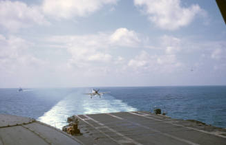 Color slide depicting an aircraft approaching for landing