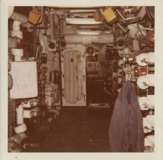 Color photograph of a boiler room (fireroom) on USS Intrepid