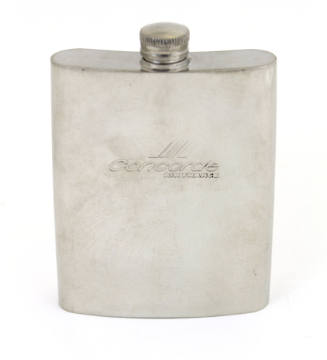 Square silver metal flask with screw-on cap, imprinted text on front, center reads, "Concorde A…
