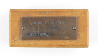 Plaque with engraved inscription, "John J. Ekelund Plank Owner USS Growler (SSG-577)," screwed …