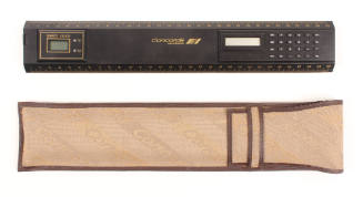 Concorde black plastic ruler, with attached clock and calculator,  and tan and brown case