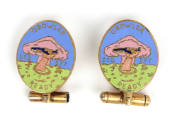 Two cufflinks with colored enamel USS Growler insignia image of a hand reaching out of water an…