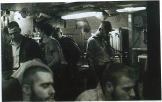 Black and white photograph of sailors in the submarine USS Growler's mess