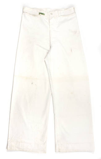 A pair of U.S. Navy white trousers lying flat