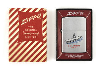 Silver Zippo lighter, in original red and white striped box, with a colored enamel image of air…