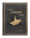 Cover of 1963 USS Intrepid cruise book, which is black with a gold image of the aircraft carrie…