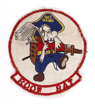 Circular embroidered patch depicting a pirate wearing a bicorn hat that says “Gas Gang,” holdin…