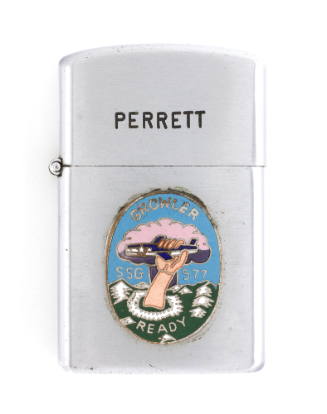 Silver lighter with USS Growler seal on the base depicting a hand reaching out of green water a…