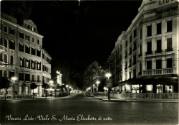 Postard with black and white photograph of St. Mary Elizabeth Avenue in Venice at night