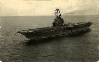 Postcard of USS Intrepid at sea in black and white