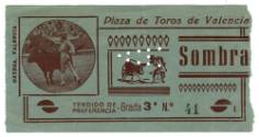 Blue ticket stub for a bullfight in Valencia, Spain with a small photo of a bull and bullfighte…