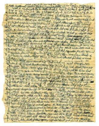 Front of a handwritten letter with blue ink utilizing the entire surface of the paper