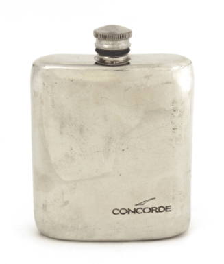 Rectangular silver flask with a screw on top, imprinted on bottom right corner is “Concorde” 