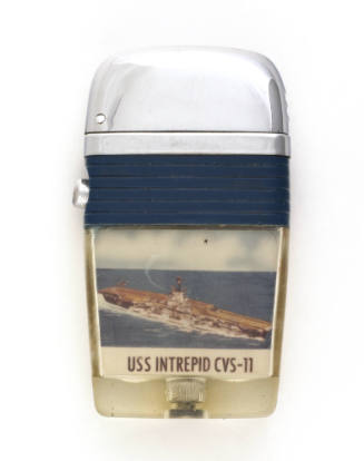Lighter with silver top and image inside interior body that depicts an aircraft carrier at sea 