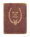 Diary with brown leather cover and gold lettering that reads "My Life in the Service" between t…