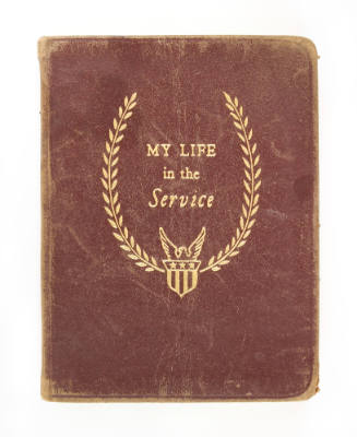 Diary with brown leather cover and gold lettering that reads "My Life in the Service" between t…